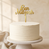 Bar Mitzvah Gold Mirror Acrylic cake topper displayed on a cake