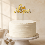 Bat Mitzvah Gold Mirror Acrylic cake topper displayed on a cake