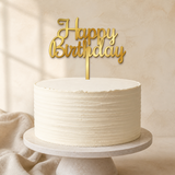 Happy Birthday Gold Mirror Acrylic cake topper displayed on a cake