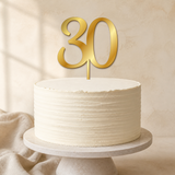 30 Gold Mirror Acrylic cake topper displayed on a cake