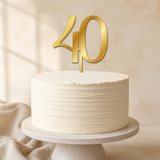 40 Gold Mirror Acrylic cake topper displayed on a cake