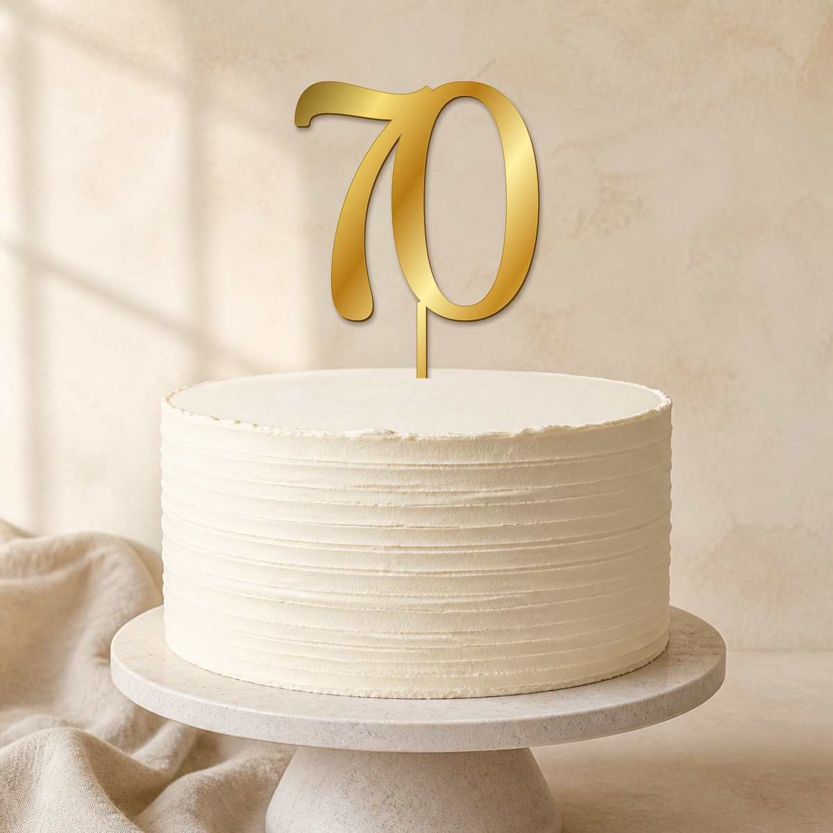 70 Gold Mirror Acrylic cake topper displayed on a cake
